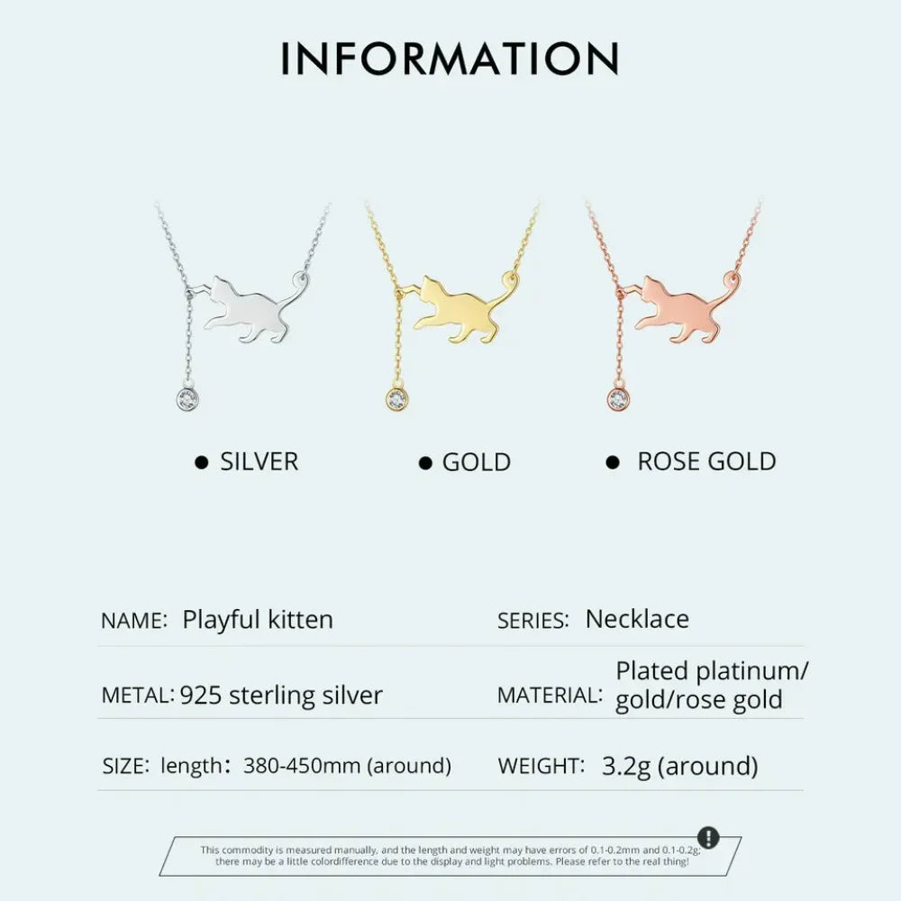 Playful kitten necklace in silver, gold, and rose gold on a white background with product details.