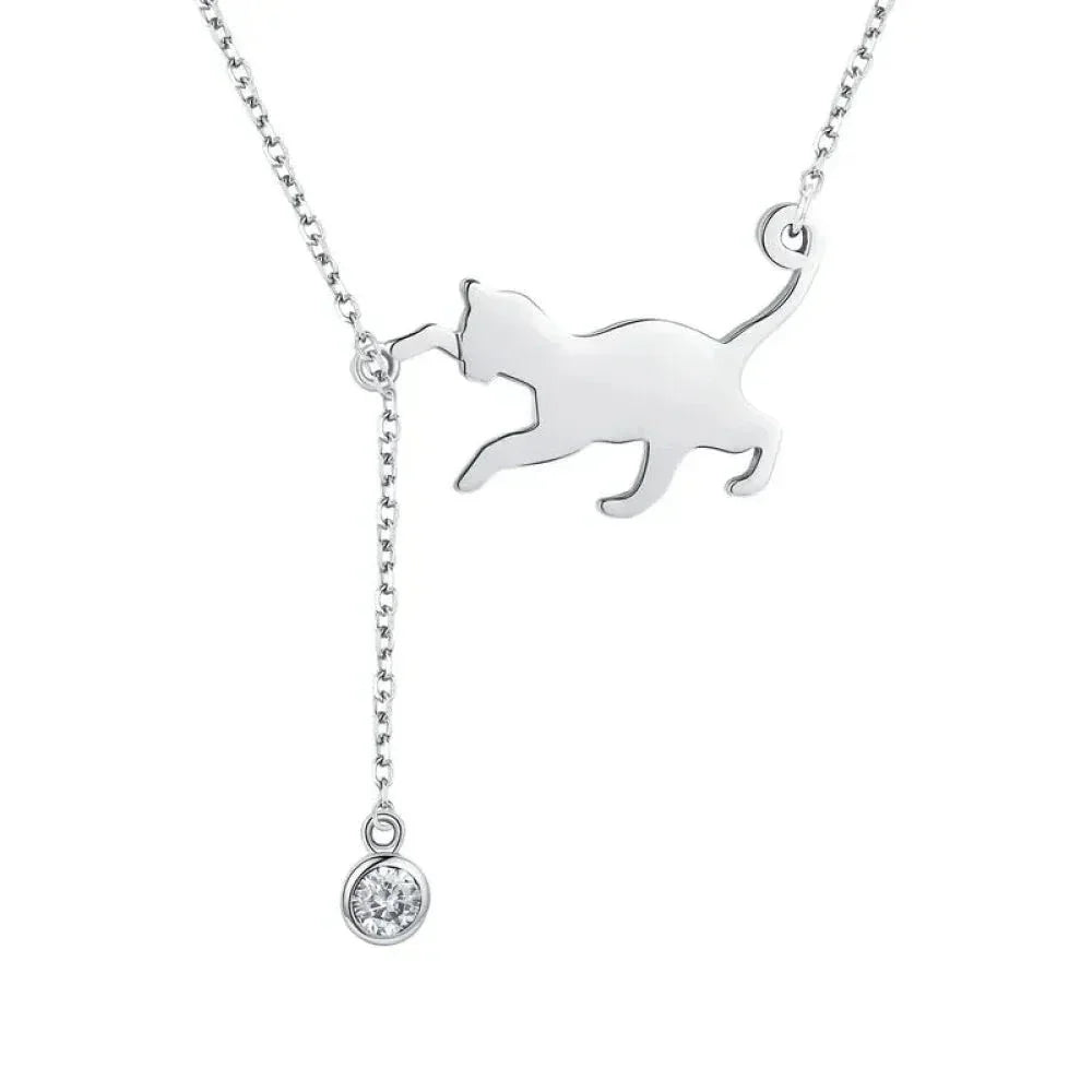Silver cat-shaped pendant necklace with a small round diamond on a white background