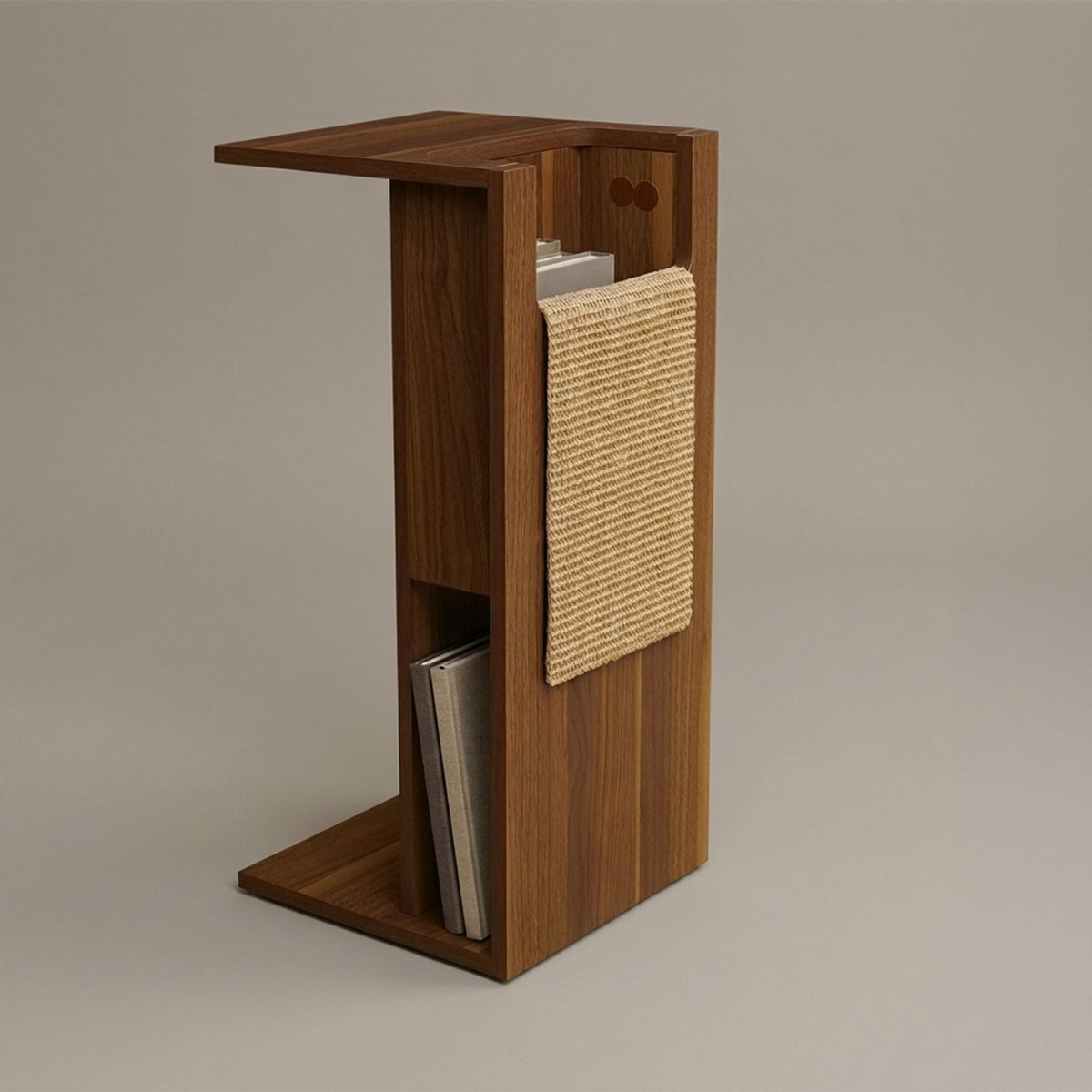 Wooden side table with a shelf and storage compartments on a beige background