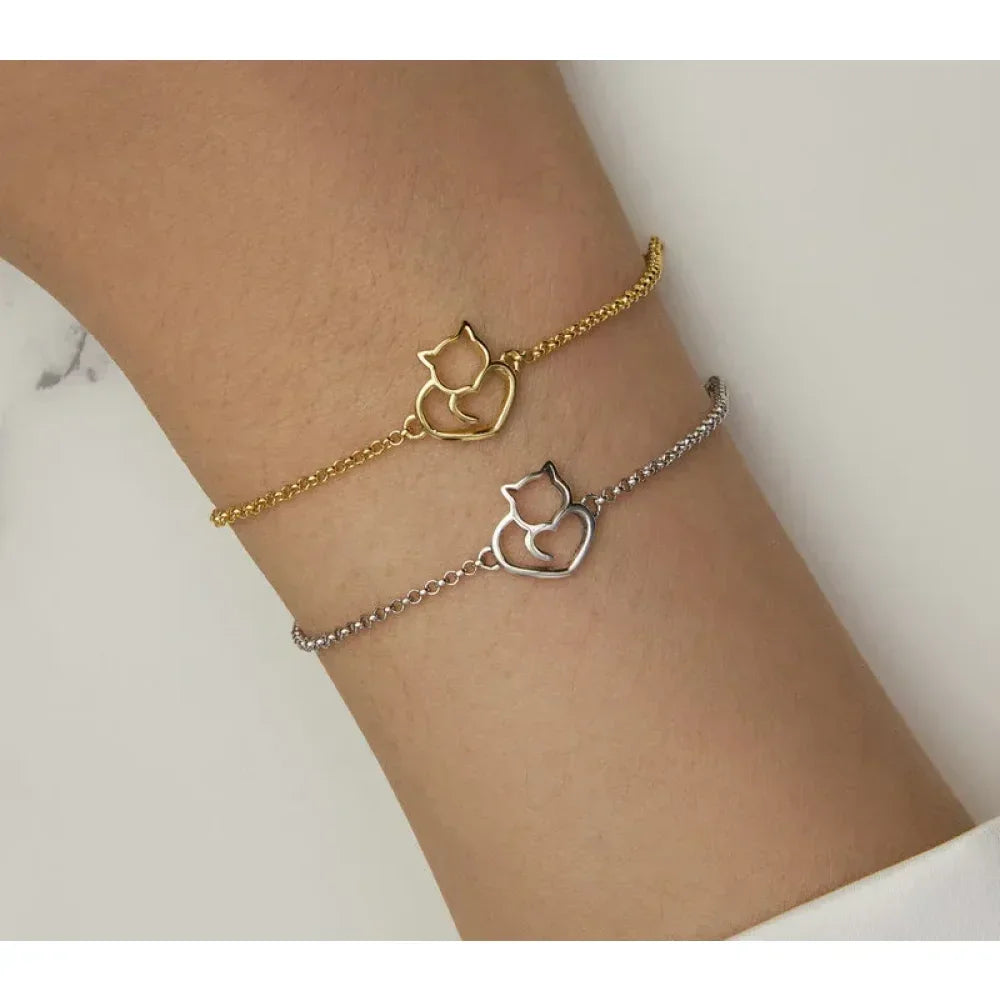 Minimal cat heart bracelet worn on wrist